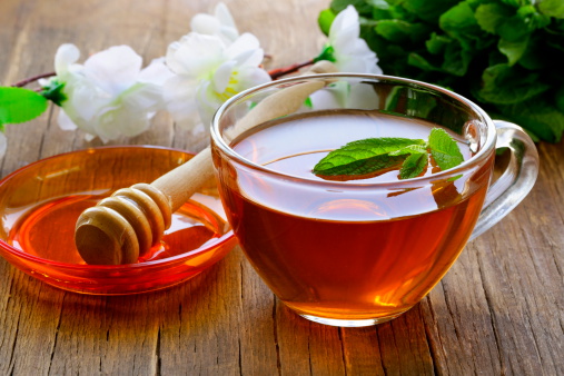 cup of tea with mint and honey